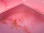 Aerial view of Hutt Lagoon pink salt bed lake in Yallabatharra, Australia.