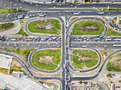 Aerial view of geometrical roundabouts and roads in Rimac, Peru.