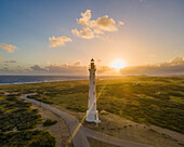 Aerial view of the sunrise at the California Lighthouse in Aruba.
