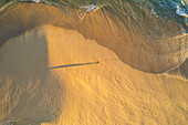 Aerial view of a person on the beach at Playa de los Amantes, Cabo San Lucas, Baja California, Mexico.