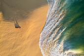 Aerial view of a person on the beach at Playa de los Amantes, Cabo San Lucas, Baja California, Mexico.