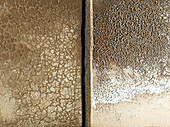 Aerial view of beautiful salt flats with abstract patterns and earthy tones, Yaiza, Spain.