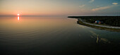Aerial view of Vormsi island coastline at sunset in Estonia.