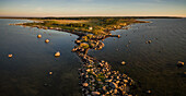 Panoramic aerial view of the edge of island Vormsi at sunset in Estonia.