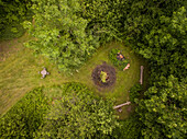 Aerial view of a campfire in the middle of the forest in Estonia.