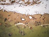 Aerial view of snowy beach in Estonia.