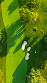 Aerial view of a golf course fairway and sand traps in autumn creating an abstract looking perspective at the Naperville Country Club in Napervile, IL - USA