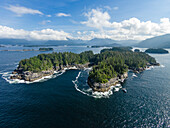 Aerial view of a commercial fisherman gill netting for salmon off of Sitka, Sitka Sound, Southeast Alaska, USA