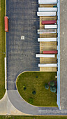 Aerial view of parked semi truck trailers at a distribution facility in Bollingbrook, IL, USA
