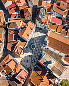 Aerial view of an old little square in Seixal old town with a city church, Seixal, Portugal.