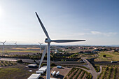 Aerial view of many wind turbines in a wind farm in countryside, La Muela, Zaragoza, Spain.