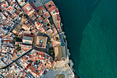 Aerial view of Sitges city hall in downtown at sunset along the Mediterranean Sea, Barcelona, Spain.