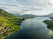 Aerial view of Lake Lucerne at sunset, from Kussnacht am Rigi with Burgenstock mountain peak in background, Schwyz, Switzerland.