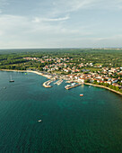 Aerial view of Fazana, a small town with a small harbour along the Adriatic Sea coastline, Istria, Croatia.
