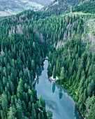 Aerial view of Braies Lake (Pragser Wildsee), a blue mountain lake on Fanes-Senes-Braies with Croda del Becco mountain in background, Dolomites, Trentino, South Tyrol, Italy.