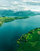 Aerial view of Lake Lucerne at sunset, from Kussnacht am Rigi with Burgenstock mountain peak in background, Schwyz, Switzerland.