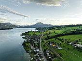 Aerial view of Mount Pilatus at sunset from Lake Lucerne, a mountain peak in Alpnach, Switzerland.