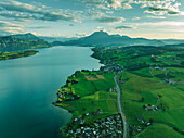 Aerial view of Mount Pilatus at sunset from Lake Lucerne, a mountain peak in Alpnach, Switzerland.