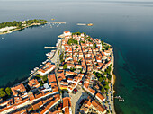 Aerial view of Porec at sunrise, a small town along the Adriatic Sea coastline in Istria, Croatia.