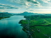 Aerial view of Mount Pilatus at sunset from Lake Lucerne, a mountain peak in Alpnach, Switzerland.