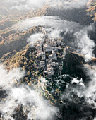 Aerial view of Civita di Bagnoreggio, a beautiful old town with badlands (Calanchi) in background, Viterbo, Lazio, Italy.