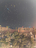 Aerial view of Yamuna Ghat with boats and serene reflections on the Yamuna River, New Delhi, India.