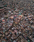 Aerial view of vibrant and bustling old Bikaner with traditional architecture and densely populated rooftops, Bikaner, India.