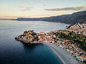 Aerial view of the picturesque coastal town of Scilla with its beautiful beach and historic castle overlooking the Mediterranean Sea, Reggio Calabria, Italy.