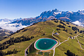 Aerial view of an artificial lake on mountain top in Champéry, Valais, Switzerland.