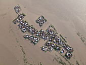 Aerial view of flooded village with submerged homes and boats, Jatrapur, Kurigram, Bangladesh.