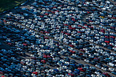Aerial view of automobiles in a parking lot with abstract patterns, Kent, Washington, United States.