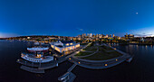 Aerial view of Seattle skyline at twilight over Lake Union Park, Museum of History & Industry, Seattle, Washington, United States.