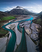 Aerial view of Aoos river estuary with mountain in background, Tepelena, Gjirokaster, Albania.