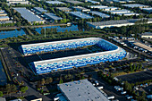 Kent, United States - 27 May 2020: Aerial view of the modern Blue Origin Aerospace company complex with organized parking lot and greenery, Kent, Washington, United States.