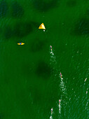 Aerial view of Triathlon, persons, and kite surfing in Progreso, Yucatan, Mexico.