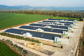 Aerial view of livestock farms covered with solar panels, Galilee Panhandle, Israel.