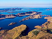Aerial view of Langisfor Lake with volcanic mountain summit in sunset, Lake Argyle, Western Australia.