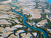 Aerial view of winding river and coastal wetland in Accident Inlet, Gulf of Carpentaria, Karumba, Queensland, Australia.