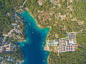 BRAC ISLAND, CROATIA - AUGUST 2014: Aerial view of resort on the Adriatic coast.