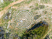 Aerial view of mystical stone formation on the coast of Kamenjak in Istria, Croatia.