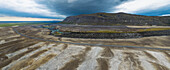 Aerial panorama of mountain Burfell and dry river Thjorsa with road and tephra from Hekla volcano, Iceland.