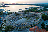 Aerial view of Pula arena and amphitheater in Pula old town, Croatia.