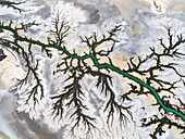 Aerial view of river, wetlands, and mangroves in serene Accident Inlet, Gulf of Carpentaria, Karumba, Queensland, Australia.
