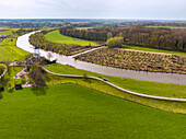 Aerial view of river Linge, pollarded willows and mill, Marienwaerdt, Betuwe, Gelderland, Netherlands.