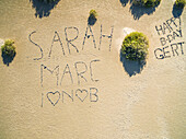Aerial view of Birthday message wrote on the beach in Fuerteventura, Canary Islands.