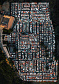Aerial view of organized tombstones in a beautiful grid pattern, Pisticci, Italy.