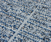 Aerial view of snowy rooftops and buildings in a winter landscape, Vurnary, Chuvash Republic, Russia.