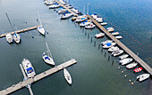 Aerial view of anchored sailing and fishing boats, Hälsö, Gothenburg Archipelago, Sweden.