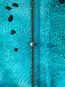Aerial view of a long jetty across the reef, Nalaguraidhoo Atoll, Maldives.