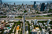 Aerial view of urban crossroad in high perspective, Dadar East, Mumbai, India.